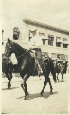 Pete Brubeck on horse track (facing camera)