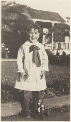 Dave Brubeck standing in smock with flowing tie