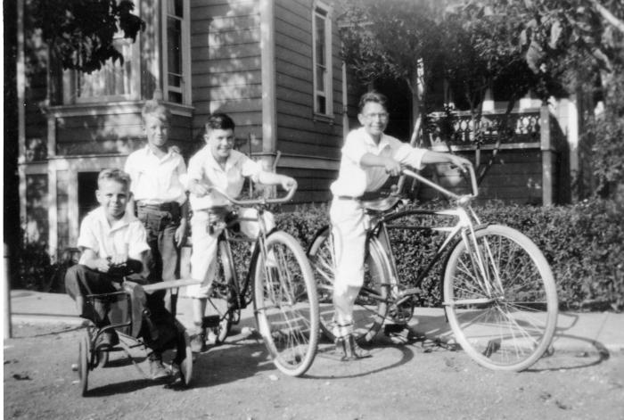 Dave Brubeck, Bob Skinner, and two unidentified boys on bicycles (Concord, California)