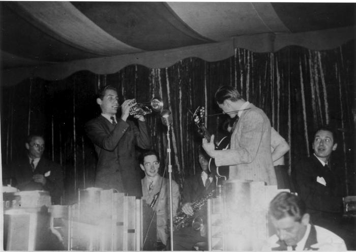 Paul Desmond holding clarinet in background ("Tin Pan Alley," San Francisco, California)