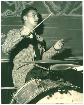 Cal Tjader in performance on drums