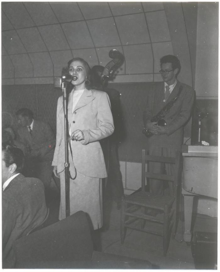 Frances Lynne, vocals, Paul Desmond on also saxophone, and Norman Bates on bass in performance ("The Bandbox," Menlo Park, California)