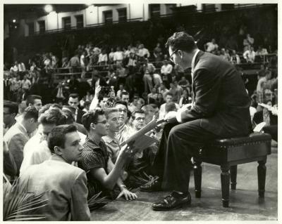 Dave Brubeck, students handing Dave Brubeck albums to autograph (Gainesville, Florida [?])