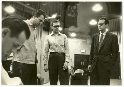 Norman Bates (profile, in foreground), Dave Brubeck, Joe Morello, and Paul Desmond listening to playback #1 (New York City, New York [?])