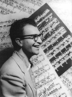 Dave Brubeck in profile against sheet music background  (New York City, New York)