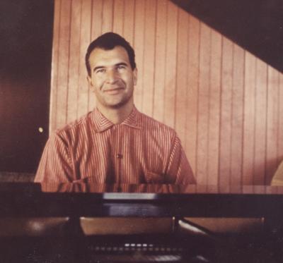 Dave Brubeck at piano in home #4 -- (Oakland, California) (color, 6.5 x 8.5; credit: Bethlehem Pacific)