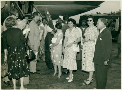 Dave Brubeck (in profile, holding bouquet), Joe and Mrs. Morello, unidentified dignitaries, Eugene Wright (Baghdad, Iraq)