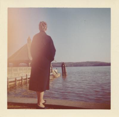 Iola Brubeck standing by pier (Lake Tahoe)