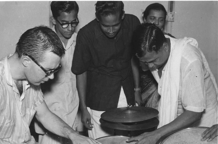 Joe Morello showing his drum set to unidentified Indian musicians (Madras, India)