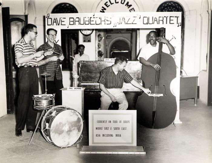 Classic Dave Brubeck Quartet beneath welcoming banner (Hyderabad, India)