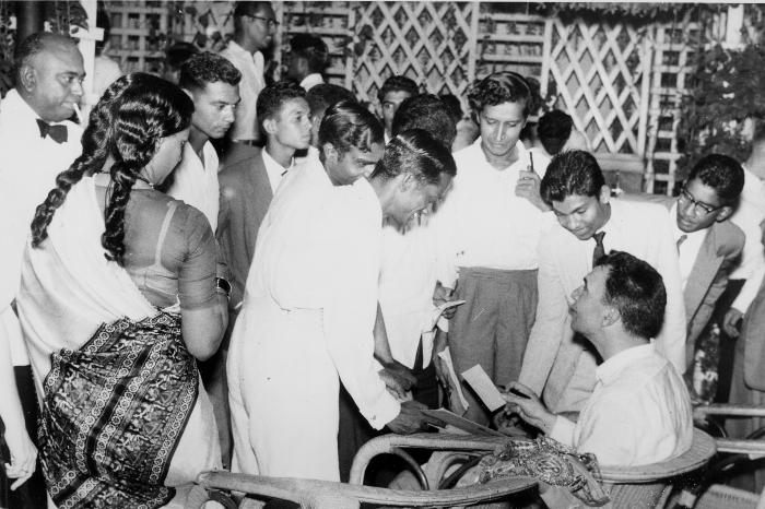 Dave Brubeck signing autographs, A. Daniel upper left (Madras, India)