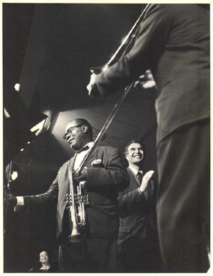 Iola Brubeck, Louis Armstrong, and Dave Brubeck at performance of "The Real Ambassadors" (Monterey Jazz Festival, Monterey, California)