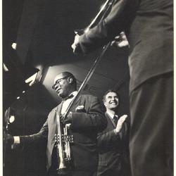 Iola Brubeck, Louis Armstrong, and Dave Brubeck at performance of "The Real Ambassadors" (Monterey Jazz Festival, Monterey, California)