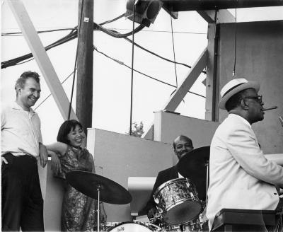 Dave Brubeck and Toshiko enjoying a moment with Jo Jones on drums and Willie "The Lion" Smith at piano (Newport Jazz Festival, Newport, Rhode Island)