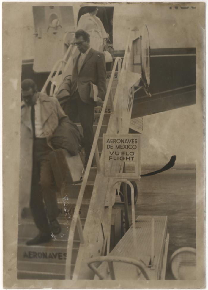 Dave Brubeck and Joe Morello disembarking from a plane at the airport (Mexico City, Mexico)