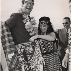 Dave Brubeck being fitted with a Maori skirt at airport (Wellington, New Zealand)