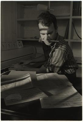 Dave Brubeck (pencil in his mouth) composing at Irving Townsend home (Wilton, Connecticut)