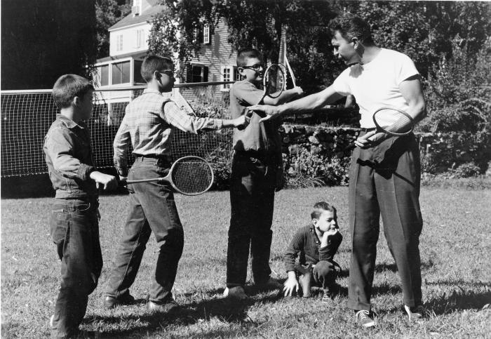 Dave Brubeck giving badminton lesson to Darius Brubeck, Michael Brubeck, Chris Brubeck, Dan Brubeck at Irving Townsend house (Wilton, Connecticut)