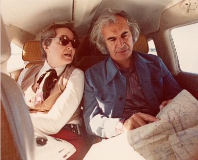 Dave Brubeck, Iola Brubeck studying map in plane