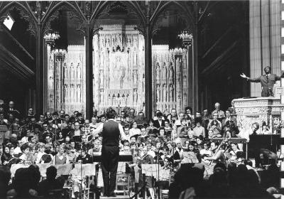 Dave Brubeck at piano, McHenry Boatwright singing, R. Wayne Dirksen conducting orchestra rehearsing "Gates of Justice" (National Cathedral, Washington, D.C.)